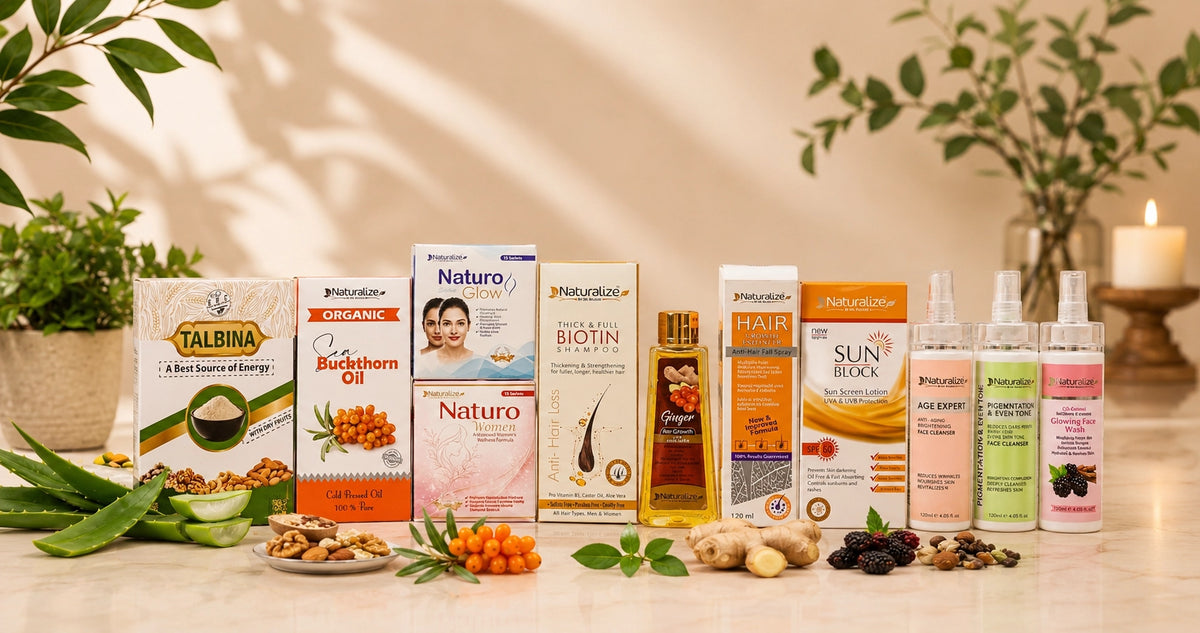 A collection of hair and scalp care products from the brands Talbina, Naturio, and Provenance, arranged on a light beige surface with natural ingredients like aloe vera, ginger, and berries, set against a warm background with soft shadows and potted plants.